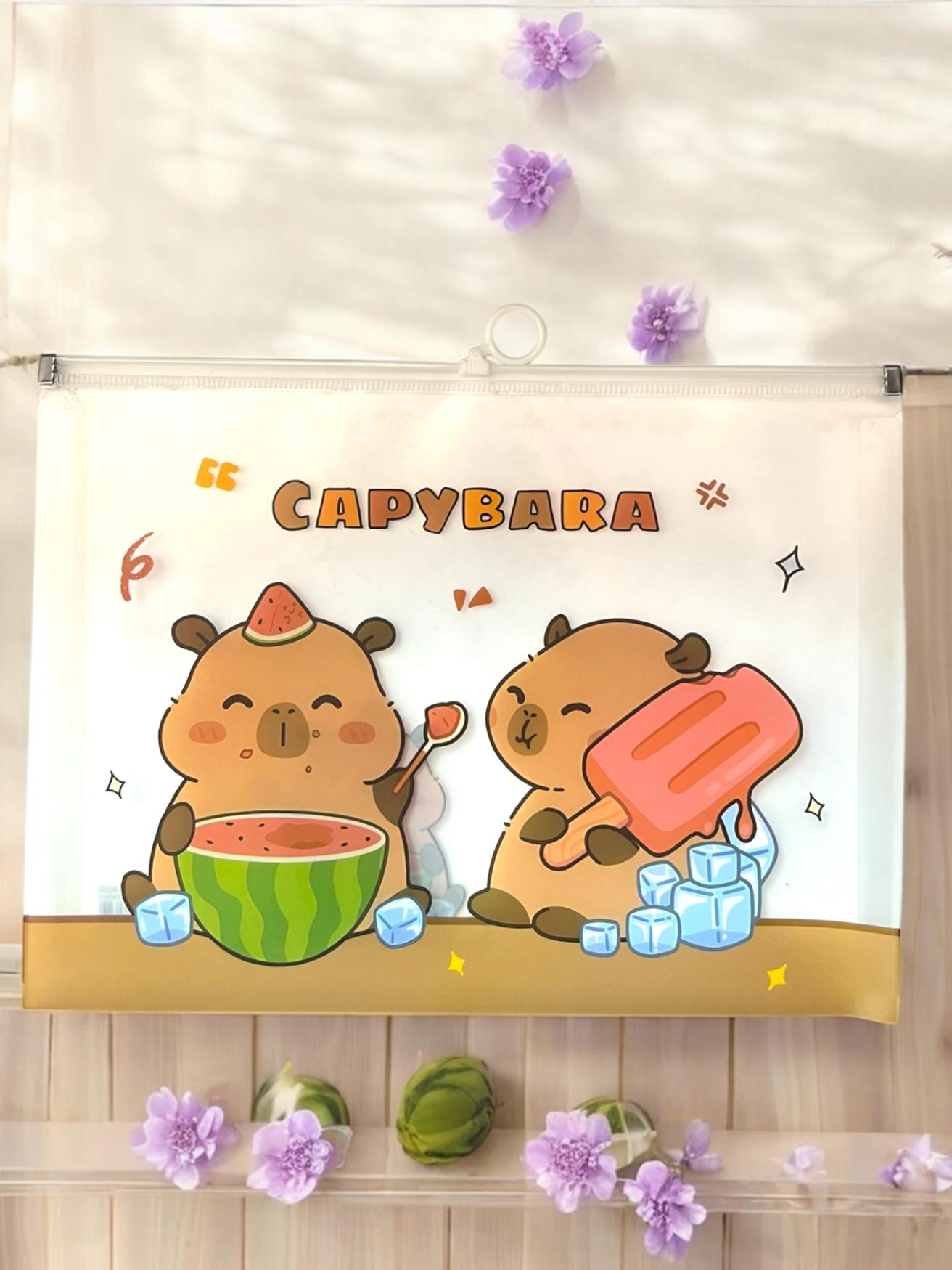 CARPETA ZIPPER CAPYBARA
