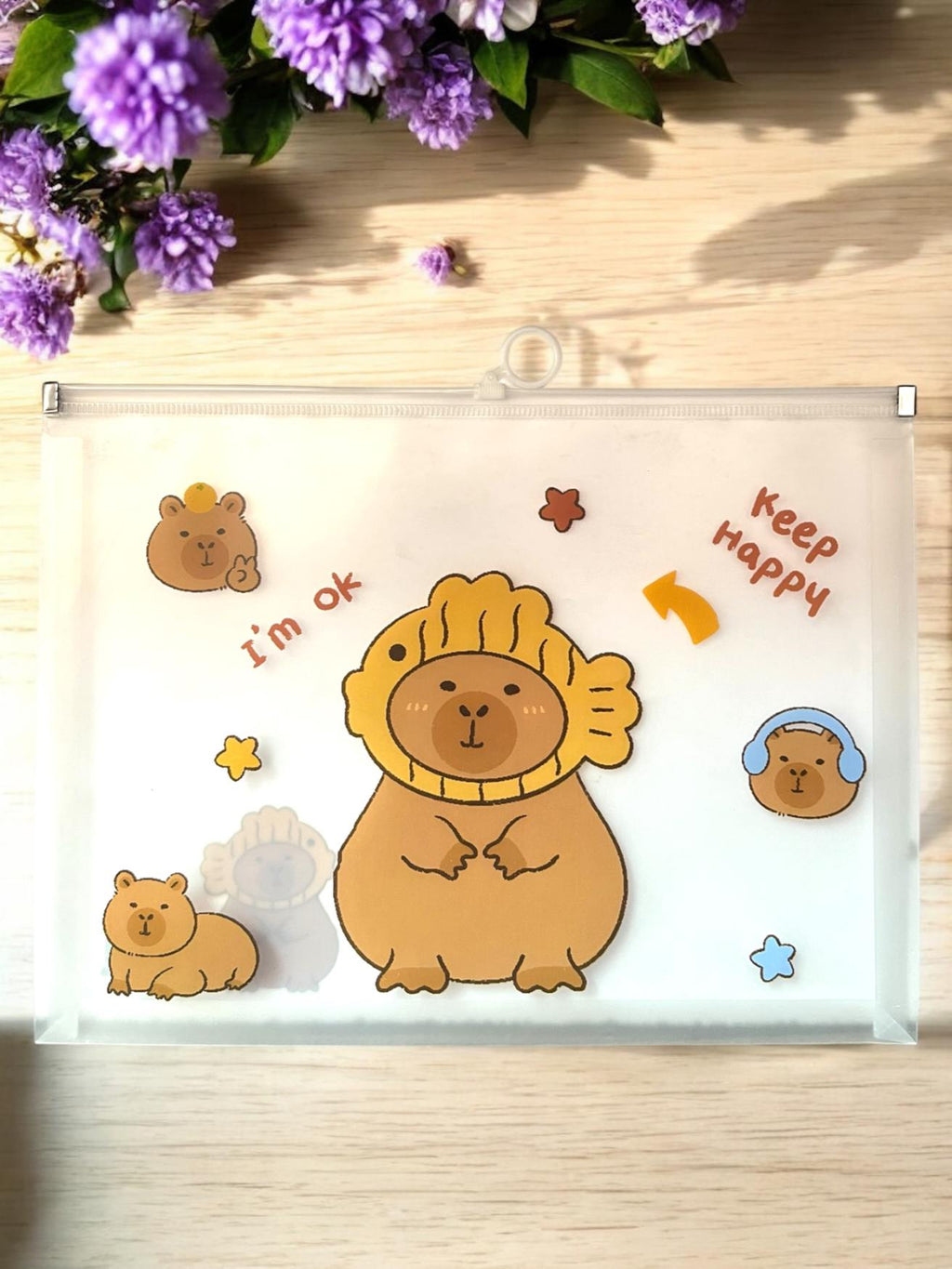 CARPETA ZIPPER CAPYBARA